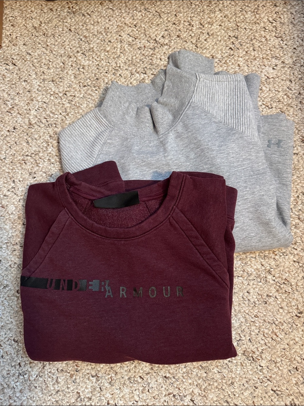 2 Under Armor sweatshirts.